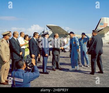 CAPE KENNEDY, Fla. -- At the Cape Kennedy Air Force Station skid strip, Dr. Kurt H. Debus, director of the Kennedy Space Center, greets returning Gemini 12 astronauts James A. Lovell and Edwin E. Buzz Aldrin Jr. following their four-day Earth orbital mission. 1966-11-16 Stock Photo