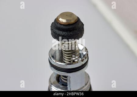 Repair of the plumbing switch of the shower valve Stock Photo