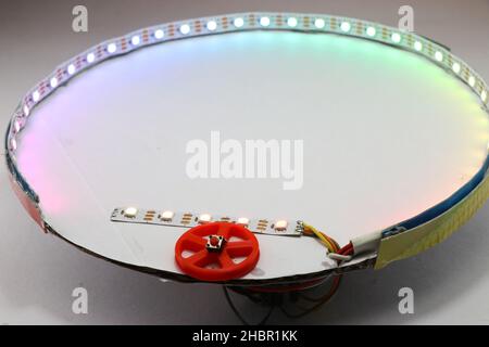 RGB LED strip light game controlled by single push button switch with levels, Creative idea with ARGB LED light strips Stock Photo
