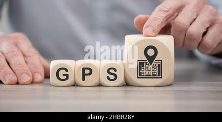 Wooden blocks with symbol of gps concept Stock Photo