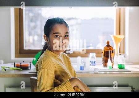 Portrait of female scientist at home Stock Photo