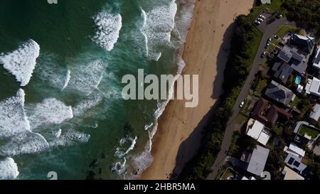 This 4K Drone shot was taken in Stanwell Tops off a beach. This beach opens to the South Pacific Ocean. Stock Photo