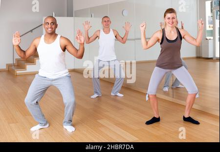 Group of multinational activity people practicing dance techniques Stock Photo