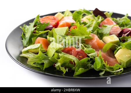 Salmon and avocado salad isolated on white background Stock Photo