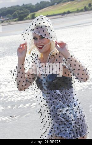 Raincoat 1960s hi-res stock photography 