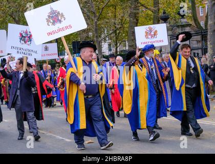 Modern Livery Companies including Insures, Firefighters, International Bankers, & World Traders march in the Lord Mayor’s Show 2021, London, England Stock Photo