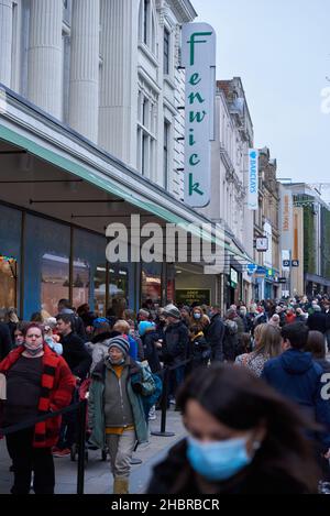 Newcastle, UK. 21st December, 2021. Busy crowds shopping on Northumberland Street in Newcastle despite a sharp rise in UK COVID-19 variant Omicron cases in England. Newcastle, UK. Credit: Garry Cook/Alamy Live News. Stock Photo