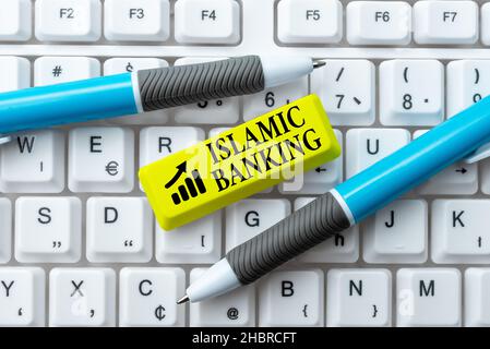 Text sign showing Islamic Banking. Business idea Banking system based on the principles of Islamic law Creating New Programming Guidebook, Typing Stock Photo