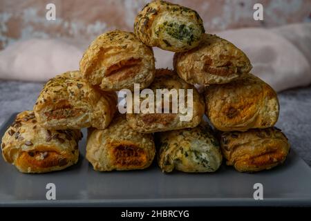 puff pastry salads with different fillings and seeds with copy space Stock Photo