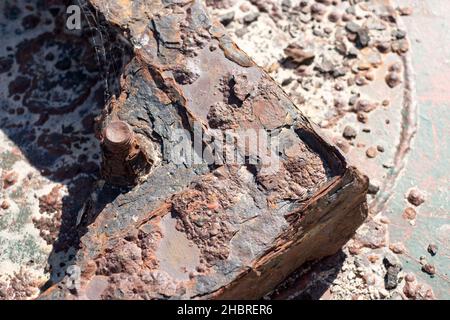 Old rusty parts of an abandoned sea beacon or buoy at the beach in Atlantida, Canelones, Uruguay Stock Photo