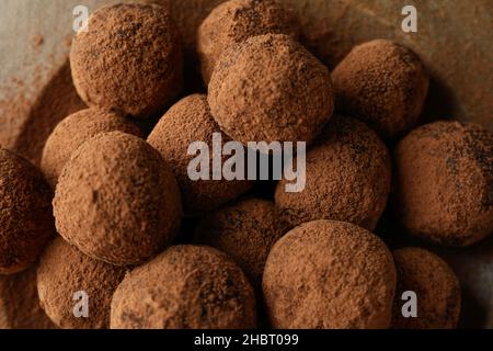 Sweet truffles on plate, close up and top view Stock Photo
