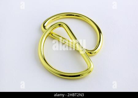 Tia D ring buckle strap semi- circular close-up on a white background. D- shaped Loop small half ring. D-Ring for purse, bag making, hanging decorativ Stock Photo