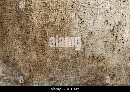 Cracked and abstract grunge texture. Aged material surface backdrop. Weathered effect pattern. Old and dirty background. Graphic resource. Stock Photo