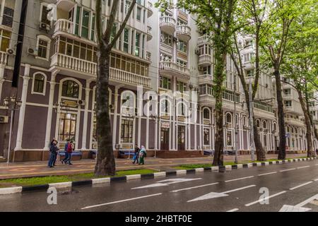 DUSHANBE, TAJIKISTAN - MAY 16, 2018: Buildings by Rudaki Avenue in Dushanbe, capital of Tajikistan
