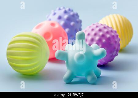 Sensory balls for kids, textured plastic multi ball set for babies and toddlers, colorful soft squeezy sensory toys to enhance cognitive and physical Stock Photo