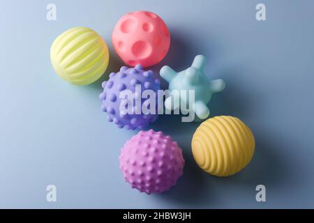 Sensory balls for kids, textured plastic multi ball set for babies and toddlers, colorful soft squeezy sensory toys to enhance cognitive and physical Stock Photo