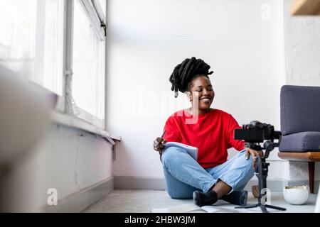 Female vlogger making social media video Stock Photo