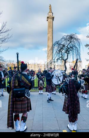 Scottish pipe band wearing kilts playing at Diwali festival event, St Andrew square, Edinburgh, Scotland, UK Stock Photo