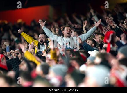 Sunderland fans celebrates their side's first goal of the game, scored by Sunderland's Nathan Broadhead during the Carabao Cup quarter final match at the Emirates Stadium, London. Picture date: Tuesday December 21, 2021. Stock Photo