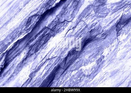 Trendy abstract natural stone background. Toned in trendy color of year 2022. Elegant marble texture background. Closeup. Soft light background for decorative design. Stock Photo
