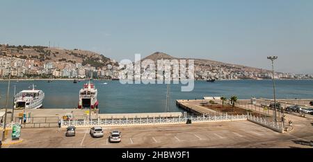 Saranda, Albania - July 29, 2021: Ferry ships moored in passenger port. Saranda is located on an open sea gulf of the Ionian Sea within the Mediterran Stock Photo