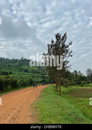 A vertical shot of a road for hiking during a cloudy day in Rwanda, Kigali Stock Photo
