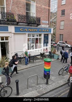 DUBLIN, IRELAND - Jul 04, 2019: A busy street area in Dublin with cafe and shoppers Stock Photo