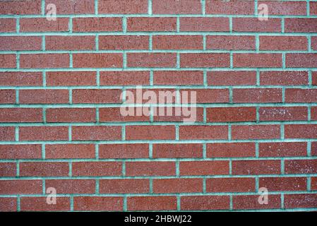 Brick wall texture on the side of stone wall or building Stock Photo