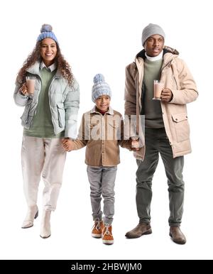 African-American family in winter clothes and with tasty hot chocolate on white background Stock Photo