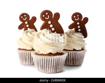 Tasty cupcakes with gingerbread cookies on white background Stock Photo