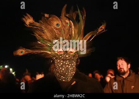 Penzance, Cornwall, UK. 21st Dec, 2021. The Montol Festival in Penzance Cornwall celebrates the winter solstice after a year off due to lock down last year. The Montol Festival, is now in it's 11th year and is part of the six days of arts and community festival. Alamy Live News Stock Photo