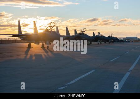 F-15E Strike Eagles assigned to the 336th Fighter Squadron sit ready to perform the NATO Enhanced Air Policing mission at Campia Turzii, Romania, Dec. 18, 2021. The NATO Air Policing mission has been executed continuously since 1961, yet frequent training and exercising is critical to ensure NATO air power remains fully prepared at all times. (U.S. Air Force photo by Tech. Sgt. Jacob Albers) Stock Photo