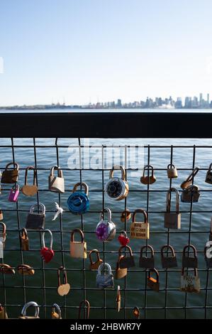 image of many colorful and different love locks on a fence in Vancouver, BC, Canada Stock Photo