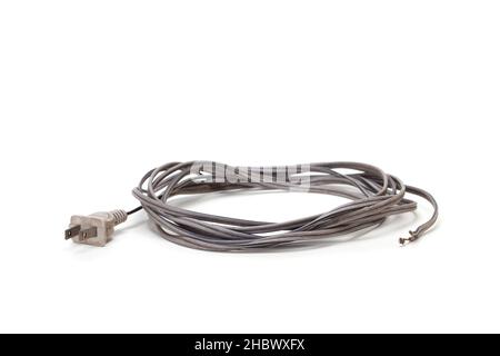 Old electricon power cord on white background with shadow Stock Photo