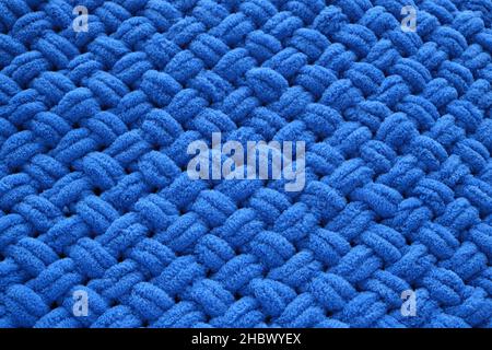 Background knitted blanket, handmade, close up of blue color Stock Photo