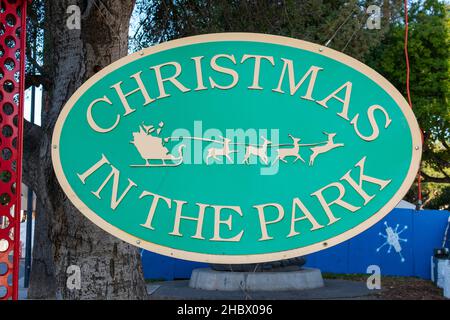 Christmas In The Park sign at the entrance to a winter event at Plaza de Cesar Chavez - San Jose, California, USA - December, 2021 Stock Photo