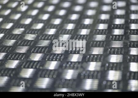 Seamless metal floor plate with diamond pattern, antislip stainless steel sheet Stock Photo