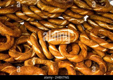 Traditional Turkish,crispy sesame bagels,simit heap,background Stock Photo