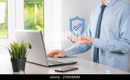 Protection network security computer in the hands of a businessman. business, technology, cyber security and internet concept - businessman pressing s Stock Photo