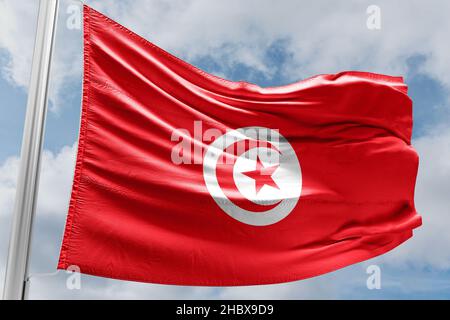 flag of tunisia waving in the wind Stock Photo