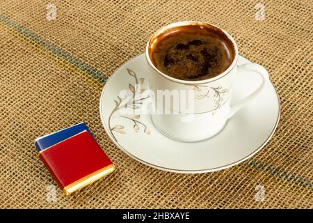 Traditional Turkish coffee and chocolates Stock Photo
