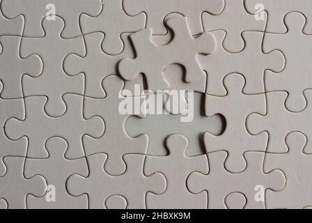 Close up image of blank white puzzle Stock Photo