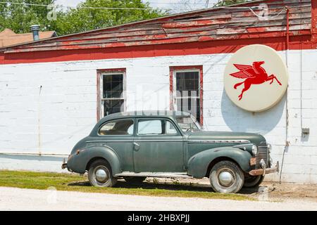 classic American 1940 Chevrolet  sedan at vintage Mobil gas station on Route 66 in Odell Illinois USA Stock Photo