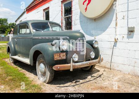 classic American 1940 Chevrolet  sedan at vintage Mobil gas station on Route 66 in Odell Illinois USA Stock Photo