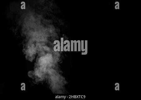 Premium Photo  Close up of steam smoke on black background. white hot  curly steam smoke isolated on black background, close-up. create mystical  halloween photos. abstract background, design element