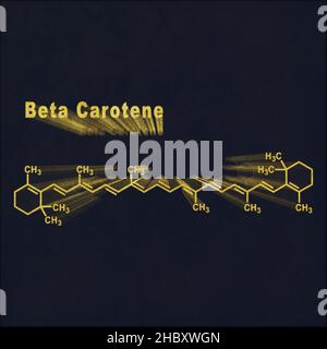 Beta Carotene, Structural chemical formula gold on dark background Stock Photo