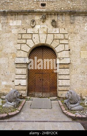 Norcia, Perugia province, Umbria, Italy: exterior of the palace known as Palazzo Comunale at morning. Door Stock Photo