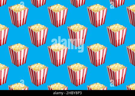 Movie popcorn pattern on blue background. Wallpaper Stock Vector