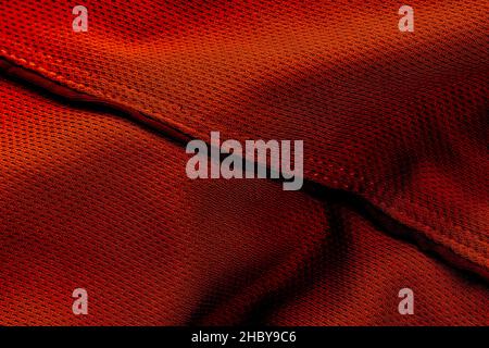 Luxurious red shiny texture on woolen fabric for the background Stock Photo