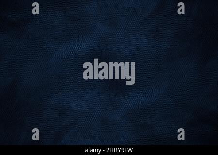 Dark blue abstract knitted fabric background with textile texture Stock Photo